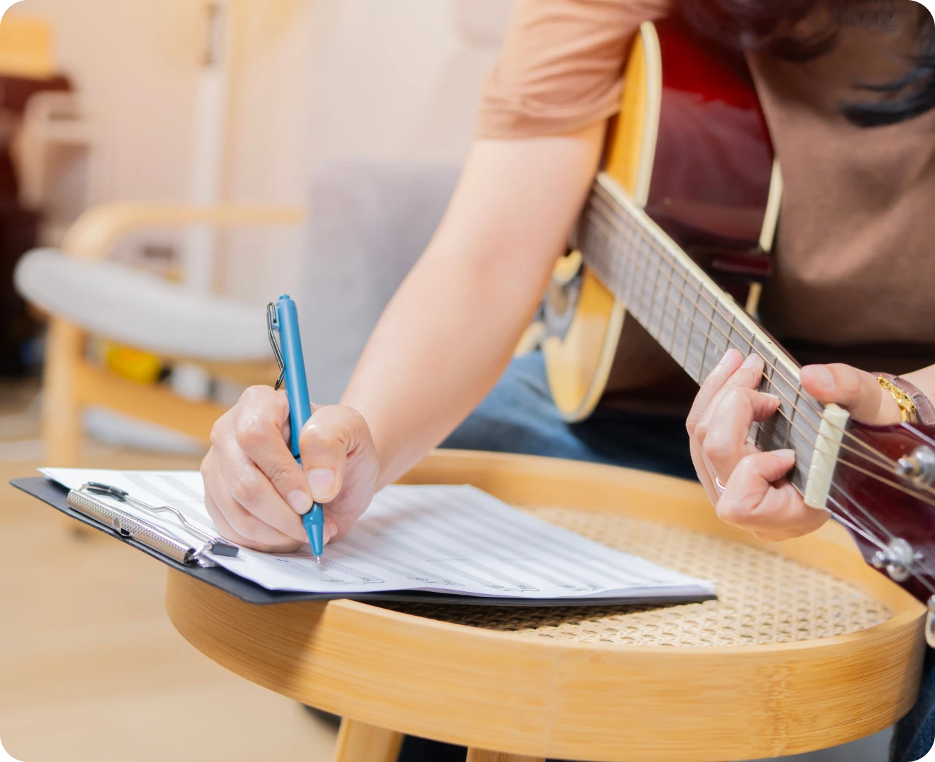Creating music on guitar and paper